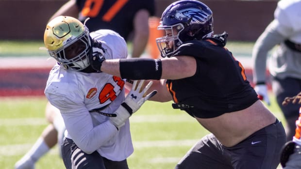Jan 28, 2021; National defensive lineman Ade Ogundeji of Notre Dame (91) drills against National offensive lineman Quinn Meinerz of Wisconsin -Whitewater (71) during National practice at Hancock Whitney Stadium in Mobile, Alabama, USA; Mandatory Credit: Vasha Hunt-USA TODAY Sports